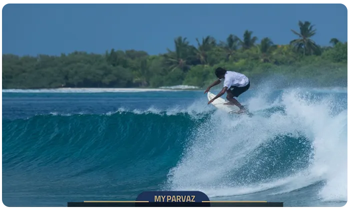 Surfers in the Maldives